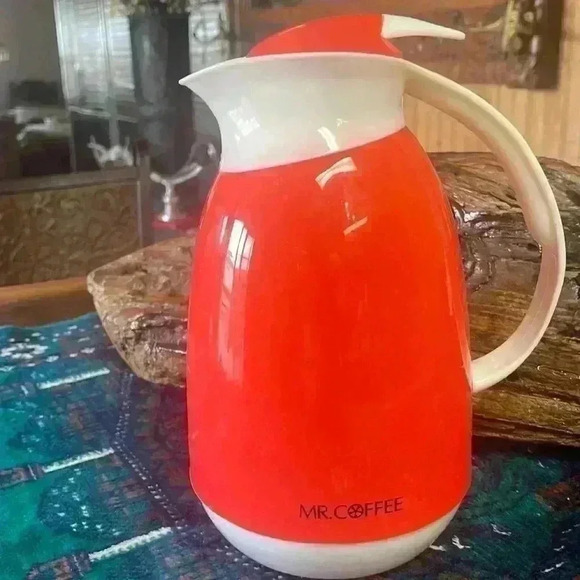 Mr Coffee Other - Mr. coffee vintage orange color container.  Holds 5 cups.